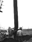 Installing one of the 105ft antenna poles