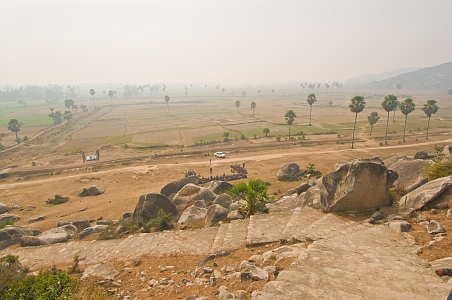 View down the Gopika cave steps to surrounding paddy fields - Click to show bigger image in new browser