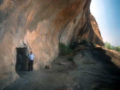 Tim Makins outside one of the upper cave entrances - Click to show full-size image in new browser