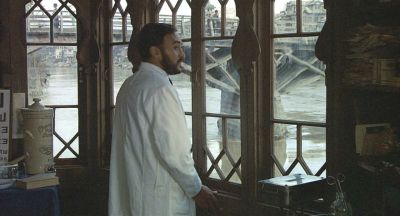 Dr Aziz looks from his hospital window - Click to show full-size image in new browser