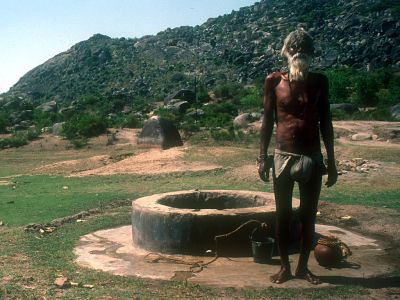 Holy man at the Barabar Well - Click to show full-size image in new browser