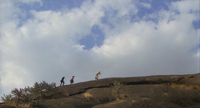 Climbing to the Upper Caves - Click to show full-size image in new browser