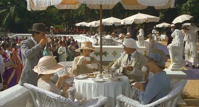 Tea on the balcony of the Chandrapore Club - Click to show full-size image in new browser