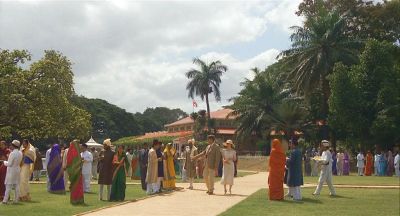 Mr Fielding and Adela in the grounds of the Club - Click to show full-size image in new browser