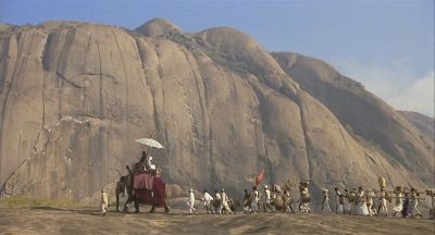 Procession led by elephant journeys to the Marabar Caves - Click to show full-size image in new browser